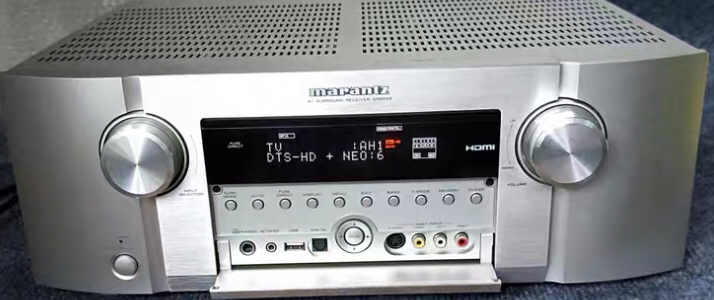 主箱6欧50-120w,中置8欧20-150w，环绕20-50w,是天龙好还是马兰士SR6003好？
